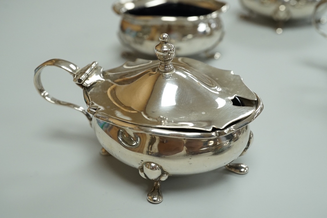 A George V eight piece silver cruet set by Walker & Hall, Birmingham, 1923, lacking spoons.